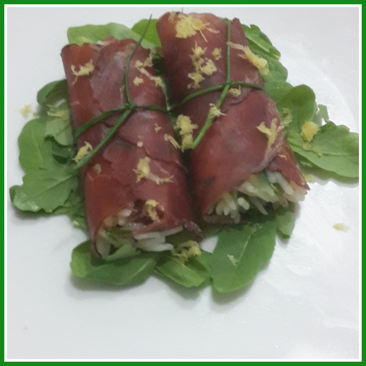 Involtini di bresaola con riso basmati, rucola e limone