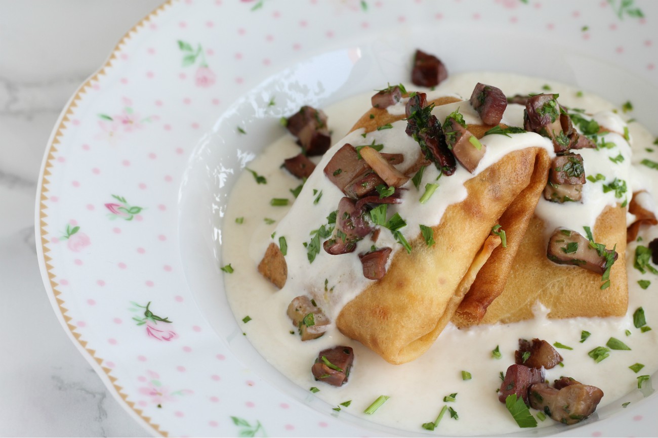 Fagottini ai funghi in crema di parmigiano