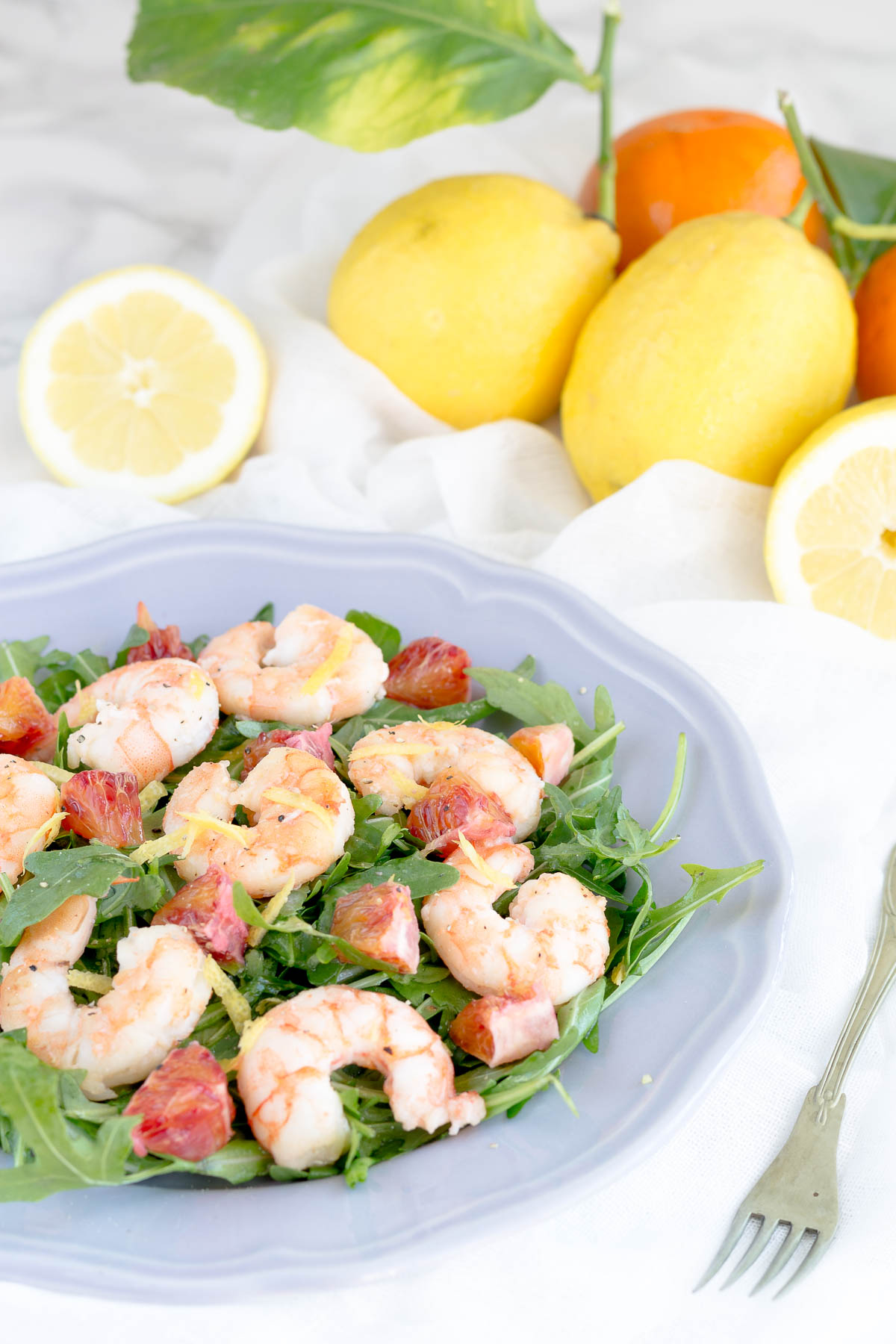 Insalata di gamberi, rucola, arancia e limone